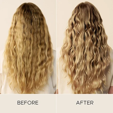 Image 7-christopherobin-en_CA - A split image shows a persons long, wavy blonde hair from behind, looking dull and frizzy on the left before treatment, and significantly shinier with defined, healthy waves on the right after treatment. BEFORE AFTER
